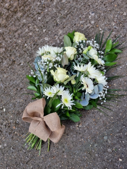 All white flowers funeral sheaf made by florist in Croydon 
