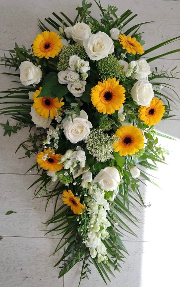 white and yellow funeral spray made by florist in Croydon for free local delivery in Croydon, Croydon Crematorium