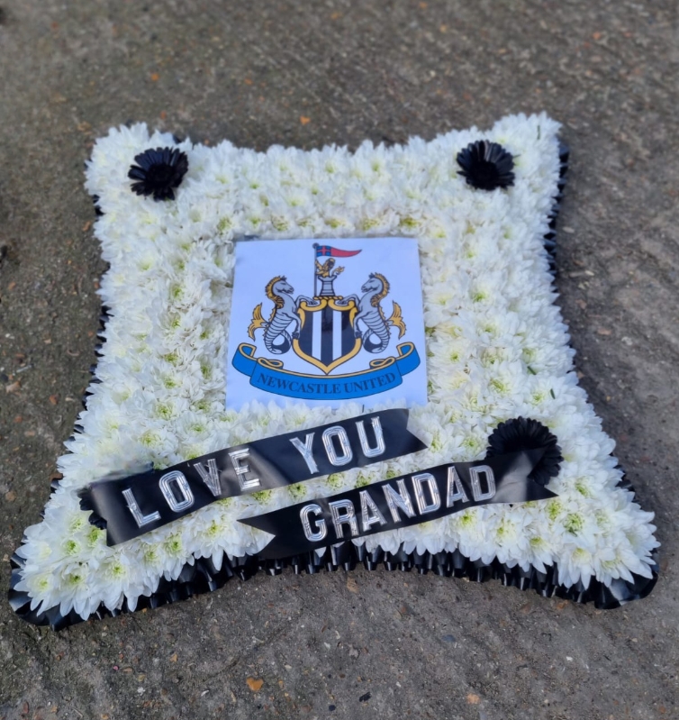 photo or logo funeral flowers cushion as photo frame by Croydon Blooms Florist