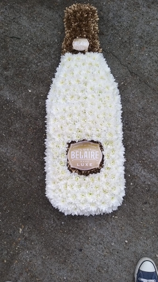 One size, approx 2.5ft long, any alkohol brand can be done By Croydon Blooms Florist