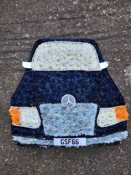 2d Funeral flowers car  by Croydon Blooms