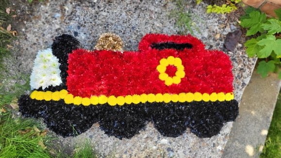 Funeral flowers train (locomotive) by local florists from Croydon.