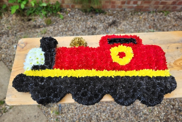 one size, funeral flowers steam train, model can be customised By Croydon Blooms Florist