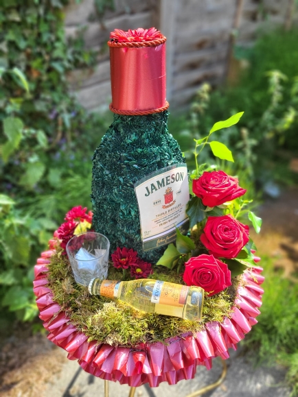 3D funeral flowers bespoke bottle of alcohol, beer.  By Croydon Blooms