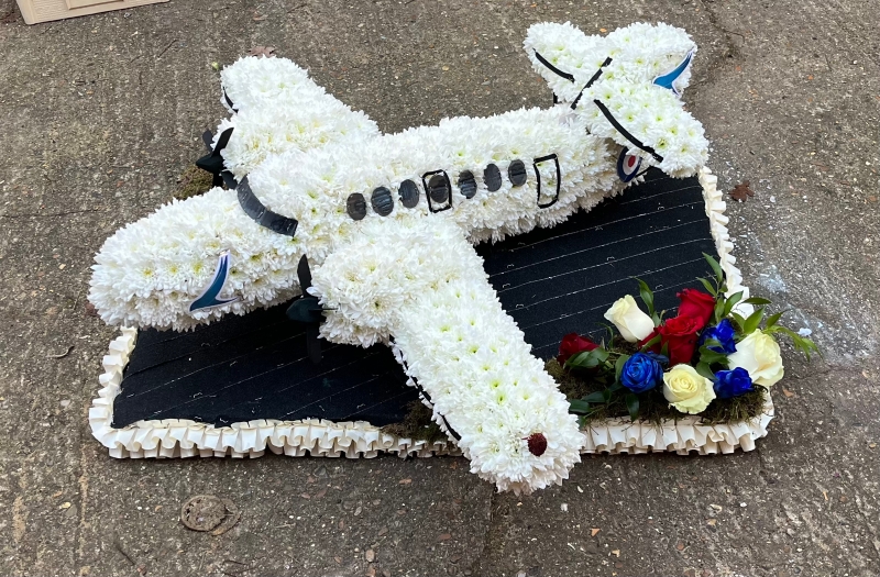 3D jet stream on designer board.  size of bottom board is 24inch x 36inch   any model od airplane can be done and personalised, please get in touch to discuss the design. Bespoke funeral flowers by florist in Croydon for delivery in South London