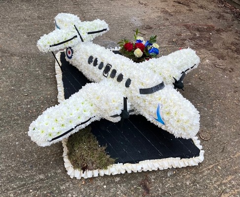 3D jet stream on designer board.  size of bottom board is 24inch x 36inch   any model od airplane can be done and personalised, please get in touch to discuss the design. Bespoke funeral flowers by florist in Croydon for delivery in South London