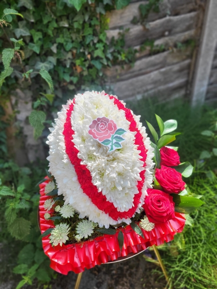 Funeral flowers Rugby Ball, any colours of sport team can be done. One size, real size. By Blooms and Candy Florist