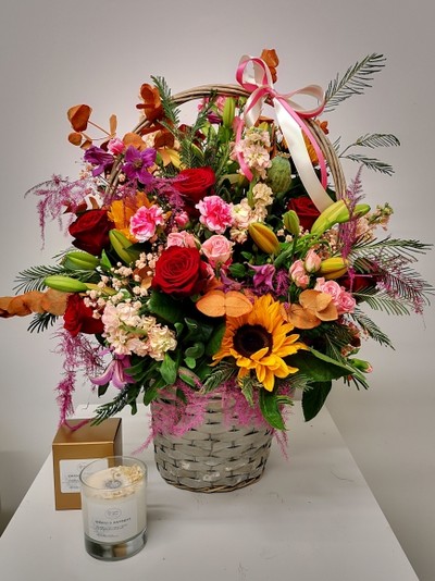 large flower basket to include fillers and foliages arranged by florist in Croydon, homemade soya wax candle included