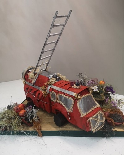 fire engine toy funeral flowers by Croydon Blooms