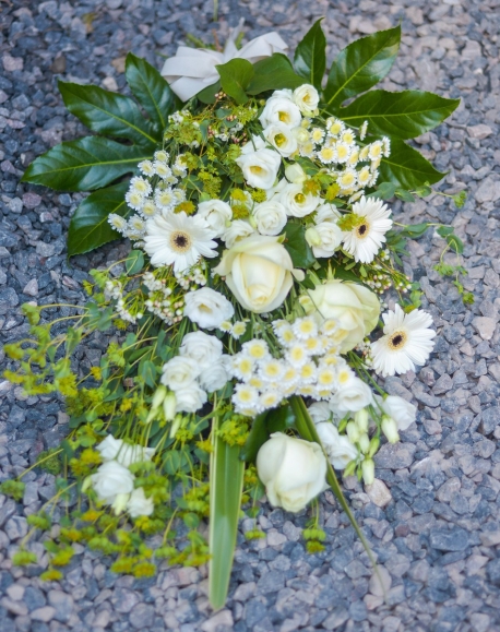 All white flowers funeral sheaf made by florist in Croydon 