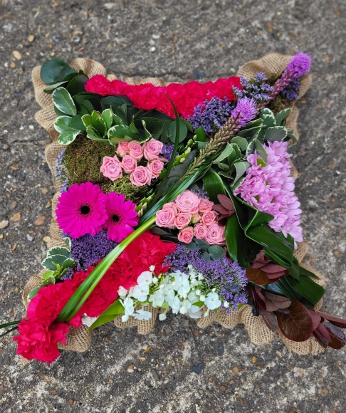 avant-garde funeral flowers cushion made by florist from Croydon