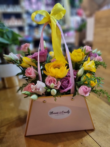 Pink Purse flowers arrangement 