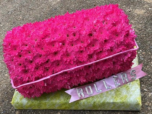 hair roller funeral flowers
