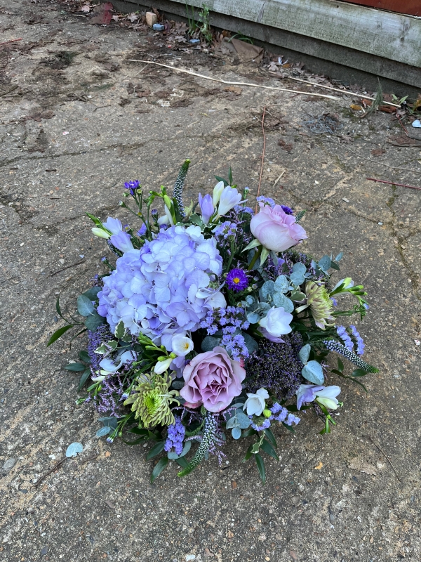 Stunning garden style lilacs and purples seasonal flowers posy made of best blooms by Croydon florist