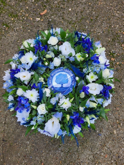 This is a florist choice of stems mixed flowers posy pad in matching colours of logo. Photo also can be accommodated. By Croydon Blooms Florist from Croydon 
