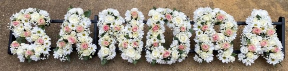 fluffy funeral letters by florist from Croydon