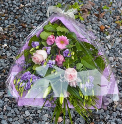 Mixed pink and purple funeral flowers, Sheaf