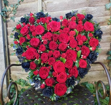 solid heart with black edges roses, standing tribute by Croydon Blooms