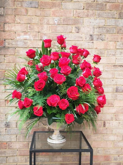 Fred roses funeral flowers urn arrangement for service