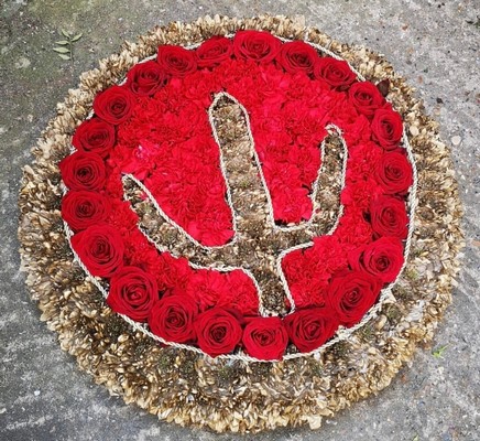 logo flowers on funeral posy