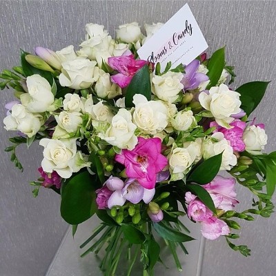 Scented Flowers with spray Roses And dresiara bouquet made by florist in Croydon