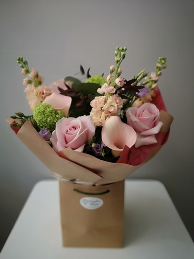 lovely delicate and elegant pink bouquet to include calla lily made by florist in Croydon, Surrey