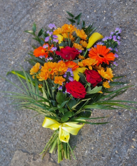 Florist choice of flowers in vibrant shade. Please let us know if you want or not Lilies to be included. by Croydon Blooms Croydon Funeral Florist