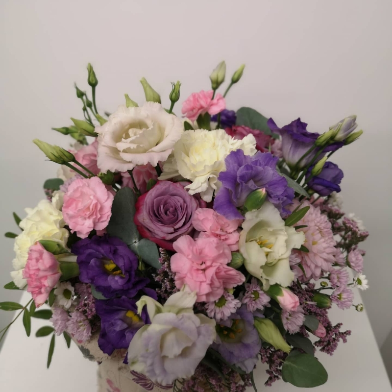 flowers round posy arrangement in natural round basket made by independent florist in Croydon, Surrey