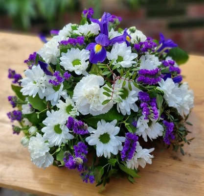 Florist choice of white and purple flowers, always full look. by florist in Croydon