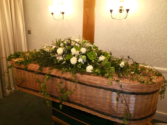 Wild ivy coffin spray for delivery in South London, dressing of the coffin at funeral directors by florist in Croydon