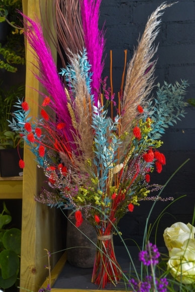 drie dflowers  pampas arrangement in natural and vibrant colors to include bunny tails, ruscus, pampas