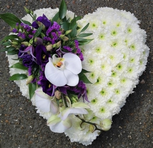 white shaped funeral flowers with white flowers to be delivered to Croydon in South London