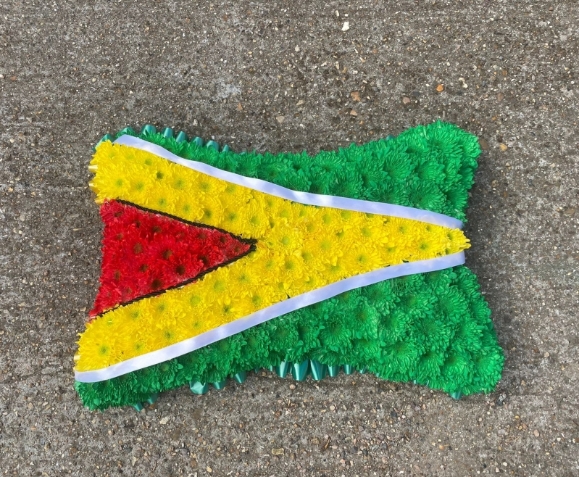 Jamaican flag funeral cushion made by florist in Croydon