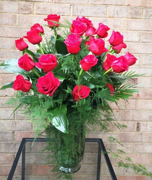 24 red roses in a vase for Valentine delivery in Croydon, South London, UK