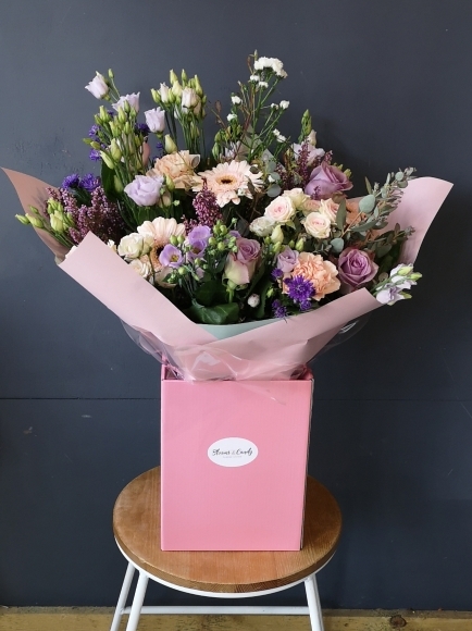 lilacs, creams and pastels fresh flowers bouquet arranged by local florist in Croydon, South London, UK