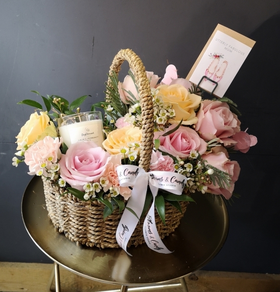 Amazing natural oval basket arrangement with pastel flowers and incorporated soya wax candle from our own collection @daydreamer made by florist in Croydon, Surrey, UK
