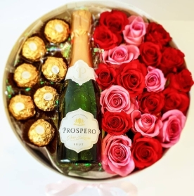  hatbox of pink & red roses, small bottle of Prosecco and tasty Ferrero Roche chocolates