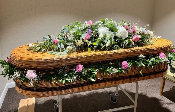 Cottage garden coffin set and garland made by florist in Croydon