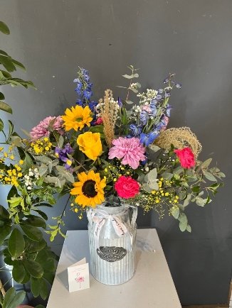 metal churn flowers arrangement for delivery in Croydon UK area