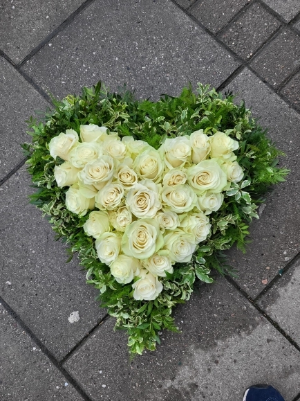 Inner solid funeral heart with roses made by funeral florist in Croydon, Surrey, UK