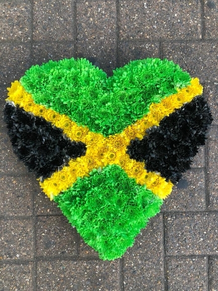 Jamaican flag funeral solid heart made by florist in Croydon, Surrey, UK
