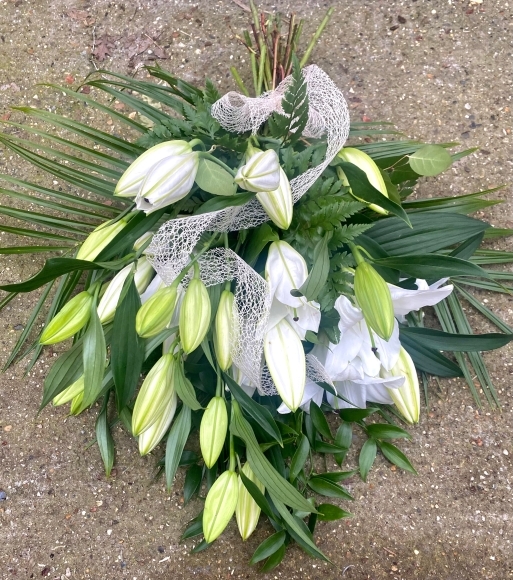 large heads funeral sheaf made of lillies for free delivery in Croydon, Beckenham and Bromley.