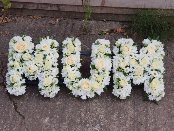 Funeral letters in white by florist in Croydon for free delivery 