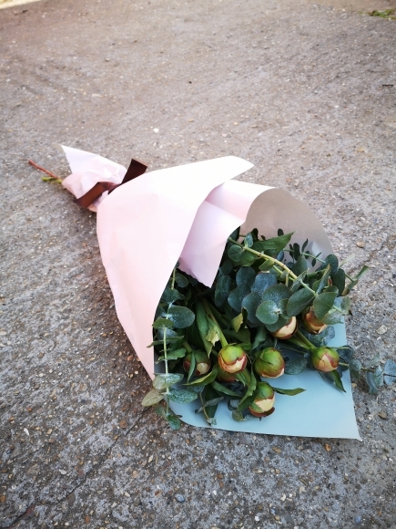 pink peonies wrap with eucalyptus wrapped in eco paper from Croydon florist