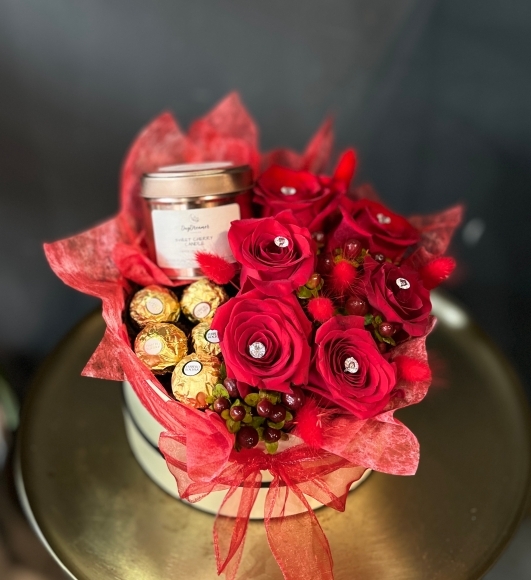 Amazing Valentine’s hat box with red roses, our daydreamer candle and Ferrero Rocher, made by florist in Croydon 