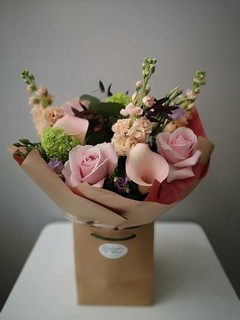 lovely delicate and elegant pink bouquet to include calla lily made by florist in Croydon, Surrey