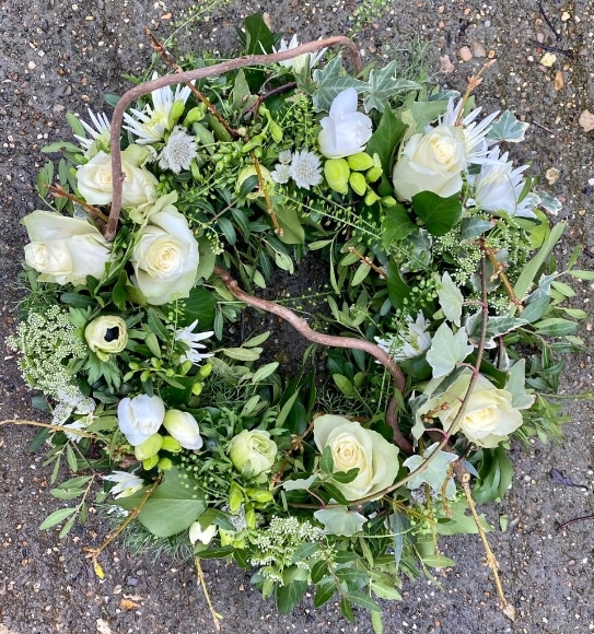 english garden funeral wreath, spray, natural look with white and cream flowers made by funeral florist in Croydon, South London for free funeral delivery