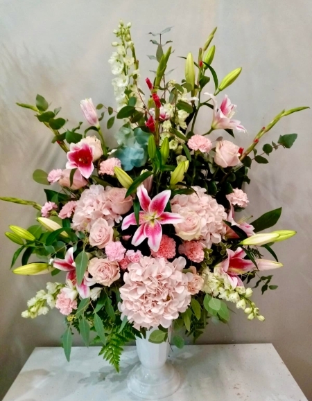 Luxury funeral wedding service arrangement in a vase made by florist in Croydon for free delivery in CR Surrey South London
